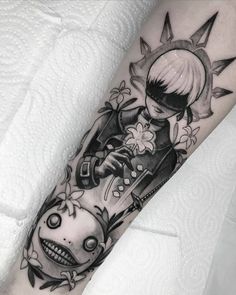 a black and white tattoo on the arm of a girl with an eyeball in her hand