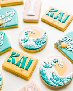 some cookies that are decorated to look like waves and the letter i is for japan