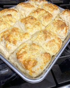 a pan filled with food sitting on top of an oven