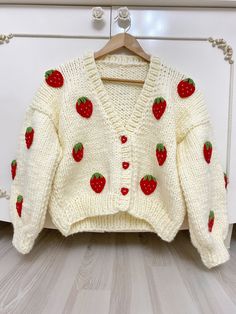 "Cute Strawberry Cardigan | Handmade | Christmas Gift For Women | Oversized Chunky Cardigan | Balloon Sleeve Cardigan ... IMPORTANT *Please don't forget to write your phone number for the shipping\" Cropped ones are 5-6 cm shorter than the other cardigans. Cropped size's length is 45cm.Standard length is 50cm.Please msg your desired height and sleeve size after choosing the size. Our knit jacket has been carefully designed to accompany you on cool summer and spring evenings & in autumn and winte Trendy Handmade Cardigan For Winter, Handmade Trendy Cardigan For Winter, Handmade Oversized Trendy Cardigan, Handmade Trendy Winter Cardigan, Handmade Cream Cardigan For Winter, Trendy Handmade Knit Cardigan, Balloon Sleeve Cardigan, Chunky Cardigan, Cute Strawberry