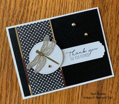 a close up of a card with a dragonfly on it and the words thank you