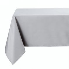 a white table cloth on top of a wooden table