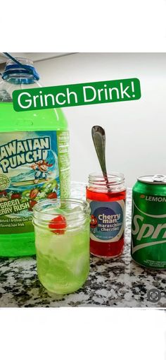 some drinks are sitting on a counter with the words grin drink in front of them