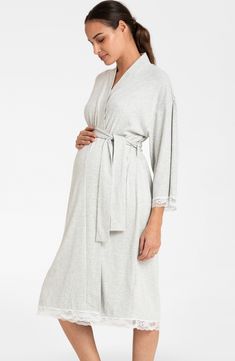 Feel the luxury of this bump-cradling robe designed with a tie belt and lacy trim. V-neck Long sleeves Removable tie belt 47% viscose, 45% cotton, 8% elastane Machine wash, line dry Imported Nursing Gown, Nursing Dress, Womens Maternity, Maternity Nursing, Dressing Gown, Tie Belt, Maternity Clothes, Gowns Dresses, Nursing