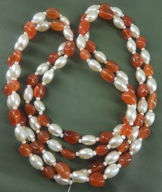 Stone Name = Orange Carnelian Size = 4x6 - 5x8 mm Approx Shape = Nugget Style = Smooth Type  = Gemstone Beads Use For Jewelry Making ( Sizes And Measurement Are Approximations....) www.etsy.com/in-en/shop/JaipurGemstoneBeads1 Customer Satisfaction Is Our Main Priority.... Thank You For Shopping  Note -------------- There Might Be Slight Change In The Color Due To Lighting So Contact Me Regarding This. I Will Be Very Happy To Serve You Best. Orange Carnelian, Carnelian Jewelry, Carnelian Necklace, Stone Names, Pearl Beads, Customer Satisfaction, Gemstone Beads, Etsy Accessories, Accessory Gift