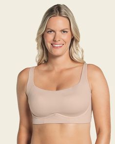 The Everyday Bra is the perfect combination of coverage, comfort, and support. It's super soft to the touch and has light structure. The back, underbust band, and sides are lined in our signature PowerSlim® fabric for a smoothing effect. It has wireless, pocketed cups with fixed contour padding for a more rounded look, naturally. High coverage under the arms, in the front, and in the back for complete confidence. It has adjustable, flat straps that can be worn classic or criss-cross. This daily Supportive Padded Bra In Solid Color, Supportive Padded Bra, Seamless Fitted Nursing Bra With Wide Straps, Fitted Seamless Nursing Bra With Wide Straps, Fitted Beige Bra With Light Support, Full Coverage Stretch Nursing Bra, Seamless Fitted Sports Bra With Full Coverage, Supportive Padded Full Coverage Nursing Bra, Supportive Beige Sports Bra With Built-in Bra