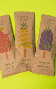 three bags with different types of fruit on them