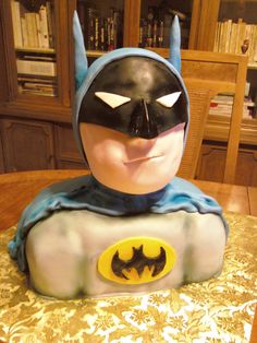 a batman cake sitting on top of a table