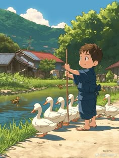 a young boy is holding a stick and standing near some ducks in front of him