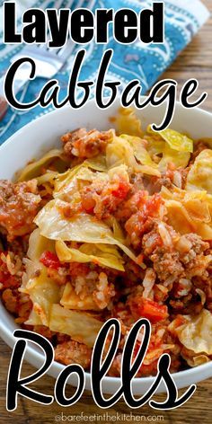 this is an image of layered cabbage rolls in a white bowl on a wooden table