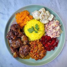 a white plate topped with different types of food