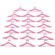 pink plastic hangers are arranged in a row on a white background, each with a single hook