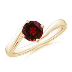 A round garnet sits in a prong setting at the center of this solitaire ring. It is styled in 14k yellow gold with a stunning twist shank that looks dainty and beautiful. This glistening garnet solitaire ring makes a bold and stylish statement with its deep red hue. 2nd Wedding Anniversary, Garnet Bracelet, Bypass Ring, Garnet Pendant, Garnet Jewelry, Garnet Earrings, Alternative Engagement Rings, Garnet Rings, Classic Ring