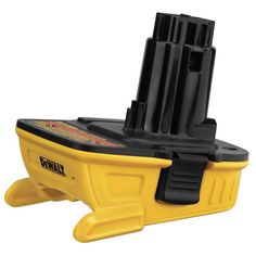 a yellow and black tool holder with two magazines on it's back end,