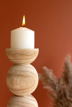 Give these neutral candle holders a roll. These holders, which look like stacked wooden balls, are the perfect neutral touch for your table, mantle, or bookshelf. They suit any style of decor and make a great gift. *Candles not included Large: 5.5"d x 16.5"t Small: 5.5"d x 12.5"t Hand Carved Candles, Ball Candles, Candle Carving, Wood Candle, Wood Candle Holders, Led Candle, Wood Candles, Candle Holder Set, Led Candles