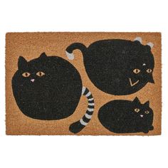 a door mat with three black cats on it