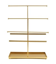 a gold metal shelf with three shelves on each side and two hooks hanging from the top