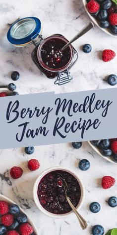 berry medley jam recipe on a table with berries and spoons next to the jar