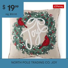 the north pole trading christmas pillow is $ 19 99 and it has a cardinal on it