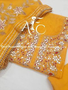 Item Overview ATHARVA Hand Embroidery Salwar Kameez /Embroidery Neck yellow/Gota Patti Chiffon Dupatta/Custom Stitch Unstitch/Gift/Plazo Dno. CH1648 🌷Fabric: * Shirt: Chanderi Silk - 2.5 Mts- Hand Embroidery Neck Work * Dupatta: Chiffon Chinnon Dupatta/Hand Embroidery Gota Patti Dupatta/2.5Mts * Bottom: Santoon Taffeta Silk Salwar 2.5 Mts. 🌷CUSTOMIZATION (No Extra Charges) * Fabrics Customization: Designs Can be made in different Fabrics. *Color Customization: Designs Can be made in different Yellow Embroidered Churidar In Georgette, Yellow Georgette Unstitched Suit For Navratri, Traditional Handwork Georgette Churidar, Traditional Georgette Churidar With Handwork, Yellow Georgette Unstitched Suit For Festivals, Traditional Handwork Kurta In Georgette, Handwork Georgette Straight Kurta, Handwork Straight Kurta In Georgette, Traditional Kurta With Handwork In Georgette