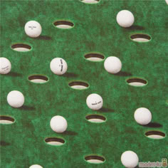 several white golf balls are placed on a green surface with holes in the grass to make them look like they're about to strike