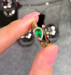 Model Number: ERD3PGX020 18K yellow gold plain snake ring Available: Yellow Gold and White Gold Metal Stamp: 18k AU750 Metals Type: 18K Gold Weight/g: 4.09 Stone: Material Emerald/ 1pc and Weight/ct 0.46 Side Stone: Diamond/1 8pcs and Weight/ct 0.12 Metal Color: Yellow Gold Setting Type: Prong Setting Gender: Unisex Fine Formal Yellow Gold Snake Ring, 14k Gold Snake Shape Ring For Anniversary, 14k Gold Snake Ring For Anniversary, Fine Jewelry Yellow Gold Snake Ring For Promise, Luxury Snake Ring As A Gift, Luxury Snake Ring With 17 Jewels For Gift, Elegant Yellow Gold Snake Ring, Elegant Yellow Gold Snake Diamond Ring, Luxury Yellow Gold Snake Shaped Ring