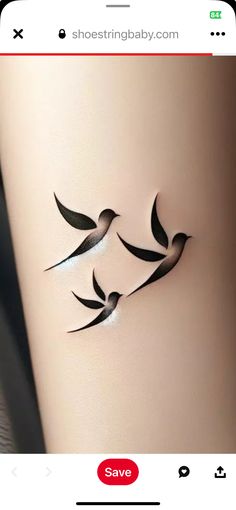 an image of birds on the side of a woman's leg