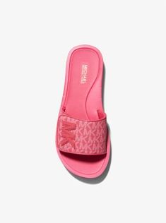 These stand-out slides bring a dose of chic to a sporty silhouette. The wide strap features logo detailing for statement style while a cushioned platform adds lift (and comfort). Perfect for a day spent poolside or running errands they complement dresses and shorts alike. Sporty Sport Sandals With Removable Insole, Summer Sports Slide Sandals, Athleisure Sports Slides For Summer, Sporty Sandals For Summer Sports, Spring Poolside Slip-on Slides, Casual Summer Sandals With Logo Strap, Casual Sport Sandals With Branded Insole, Sporty Slide Sandals For Vacation, Sporty Cushioned Sport Sandals For Summer