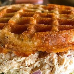 a waffle sandwich with chicken salad on it