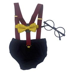 a pair of suspenders with a bow tie and glasses