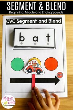 a hand holding a red stick with the word bat on it and an image of a car