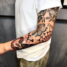 a man with a tattoo on his arm