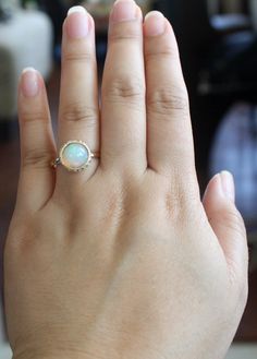 Opal Diamond Bezel Ring in 14K Yellow Gold by Studio1040 on Etsy White Opal Birthstone Ring In 14k Gold, 14k Gold White Opal Birthstone Ring, Gold Round Cut Opal Ring, Gold Opal Ring Fine Jewelry, Opal Ring With Bezel Setting, Opal Ring With Bezel Setting And Round Band, Opal Ring With Bezel Setting For Promise, Yellow Gold Round Opal Jewelry, Yellow Gold Opal Jewelry In Round Shape