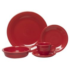 red dinnerware set with two cups and saucers on the bottom one is empty