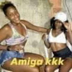 two women in bathing suits are posing for a photo with the words amigo kiki