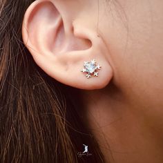 These cute dainty snowflake stud earrings features tiny snowflake design with cubic zirconia gemstone. Add these cute snowflake stud earrings to your holiday jewelry collection or as gift for your love one this holiday season. Elevate your holiday ensemble with these elegant stud earrings featuring a delicate snowflake design and sparkling cubic zirconia gemstone. Give the gift of subtle sophistication this season with these must-have snowflake studs. Materials: 925 sterling silver, cubic zircon Snowflake Sparkling Earrings For Gift, Sterling Silver Snowflake Earrings, Cubic Zirconia Snowflake Earrings For Gift, Silver Snowflake Cubic Zirconia Earrings, Tiny Snowflake, Snowflake Design, Silver Snowflakes, Sterling Silver Stud Earrings, For Your Love