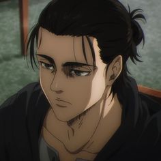 an anime character with black hair and blue eyes looks at the camera while sitting down