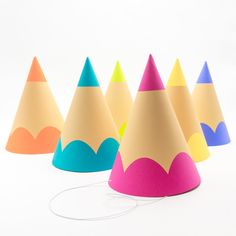 colorful party hats sitting on top of each other