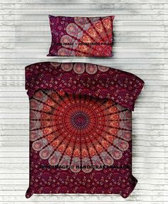 two bedspreads with red and purple designs on them