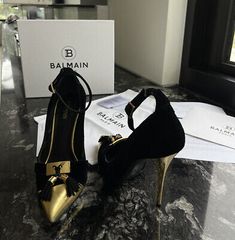 (eBay) Authentic Like-New Balmain Women’s Black Velvet Pumps Shoes Gold 40 RRP $1,500 Luxury Evening Court Shoes With Heel Strap, Luxury Gold Heels With Contrasting Heel Counter, Luxury Formal Court Shoes With Heel Strap, Designer Round Toe Court Shoes For Formal Occasions, Designer Evening Court Shoes With Leather Sole, Designer Court Shoes With Round Toe For Formal Occasions, Designer Round Toe Court Shoes With Contrasting Heel Counter, Designer Court Shoes With Reinforced Heel, Designer Heels With Rubber Heel Cap And Pointed Toe