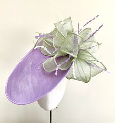 Lavender Curved Brim Fascinator For Royal Ascot, Purple Fascinator For Royal Ascot Garden Party, Lavender Fascinator For Royal Ascot Garden Party, Lavender Fascinator For Kentucky Derby Garden Party, Lavender Hat Fascinator For Spring, Lavender Fascinator Hat For Spring, Lavender Fascinator For Spring, Lilac And Green, Occasion Hats