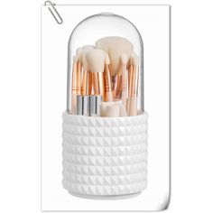 the brush holder is filled with makeup brushes