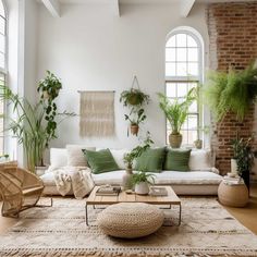 a living room filled with lots of furniture and plants on top of the couches