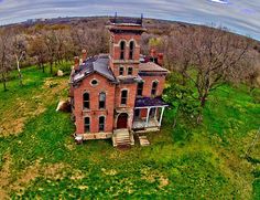 an old abandoned house in the middle of nowhere