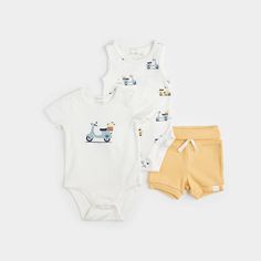 This fun 3-piece set is ideal for gifting to expecting parents or little boys who love to be on the move. The set features a short-sleeved diaper shirt, a vest and coordinating yellow shorts. The tops are made from a stretchy organic cotton jersey, so they’re comfortable while they explore their surroundings. Snap buttons at the bottom make for easy changing and the shorts can be quickly pulled up or down thanks to the gently elasticated waistband. Details: Composition: 95% Organic cotton, 5% elastane jersey and 3 x 2 rib Short sleeved and tank top-style diaper shirts Cotton rib shorts with elasticated waistband Sizes 0-24M Care Instructions: Wash before wear Machine wash in cold water, inside out, with like colors Gentle cycle Do not bleach Tumble dry low Iron on low temperature on revers Diaper Shirt, Bodysuit Shorts, Body Suit With Shorts, Expecting Parents, Ribbed Shorts, Boy Onesie, Yellow Shorts, Baby Soft, Shorts Set