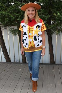 a woman wearing a toy story woody costume