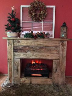 a fireplace with a christmas wreath on top