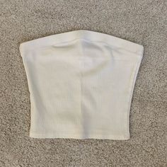 Snug Stretchy Tube Top Fits More Like An Xs. Never Worn And In Excellent Condition. White Stretch Tube Top Casual, Casual Fitted Ribbed Tube Top, Casual Ribbed Tube Top, White Cotton Tube Top For Spring, Basic White Ribbed Crop Top, Casual Ribbed Sleeveless Tube Top, Casual Cotton Tube Top, Tube Top Fits, Cropped Tube Top