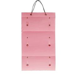 a pink shopping bag hanging from the side on a white background with clippings