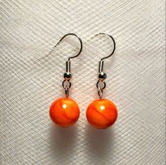 These are simple orange glass swirl bead earrings. Great for Halloween or fall and lightweight! These would make a great addition to anyone's jewelry collection! These would also make really cute gifts for friends and family! Fall Or Autumn, Cute Gifts For Friends, Fun Earrings, Bead Earrings, Glass Earrings, New Mom, Clover Leaf, Pink Ribbon, New Moms